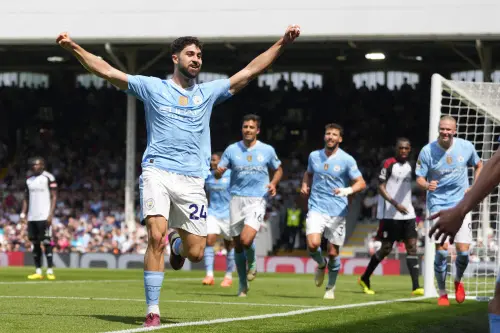 Manchester City's Josko Gvardiol celebrates after scoring his side's third goal during the English Premier League soccer match between Fulham and Manchester City at the Craven Cottage Stadium in London on Saturday. I Photo: AP/PTI