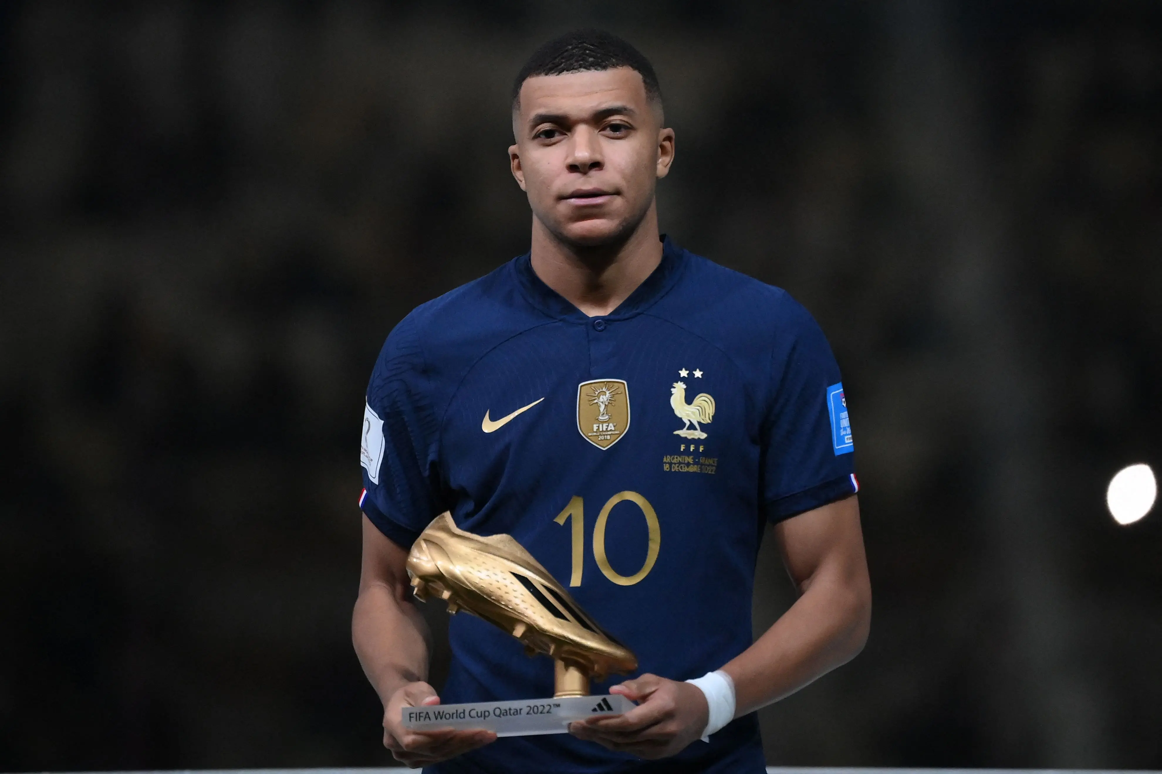 Kylian Mbappe with the Golden Boot | Photo: AFP