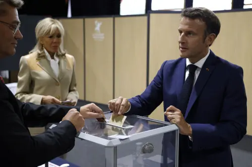 Emmanuel Macron casts his vote | AP