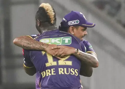 Kolkata Knight Riders player Andre Russell with teammate Sunil Narine celebrates the wicket of Lucknow Super Giants batter Nicholas Pooran during the Indian Premier League (IPL) 2024 T20 cricket match between Lucknow Super Giants and Kolkata Knight Riders, at Bharat Ratna Shri Atal Bihari Vajpayee Ekana Cricket Stadium, in Lucknow. l Photo: PTI