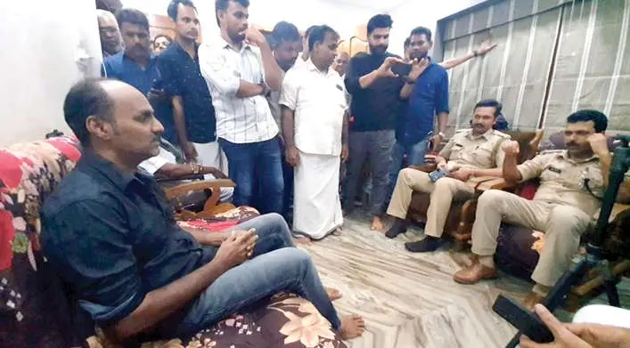 Muhammad Ashraf with police officers who came to record his statement | File Photo: Mathrubhumi
