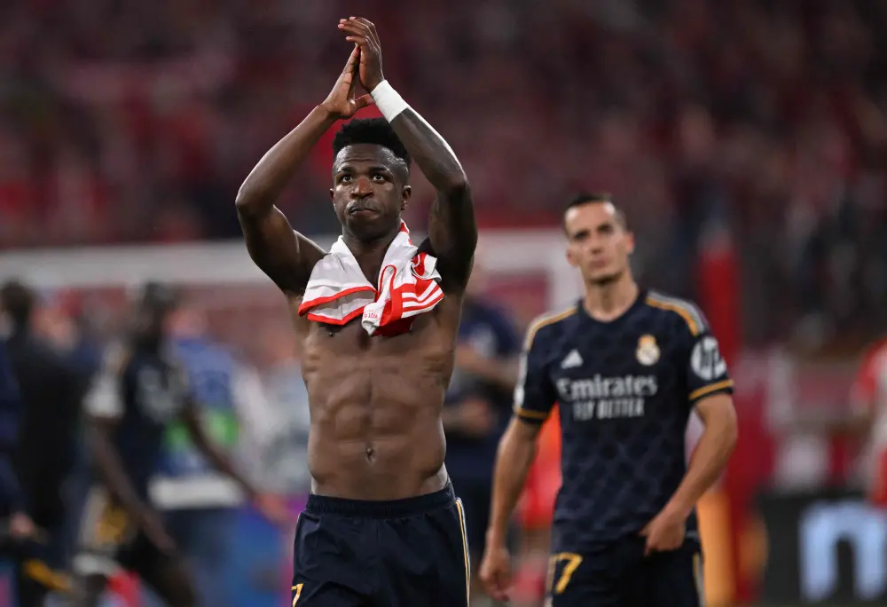 Vinicius Junior reacts after the Champions League semi-final first leg match between FC Bayern Munich and Real Madrid | AFP