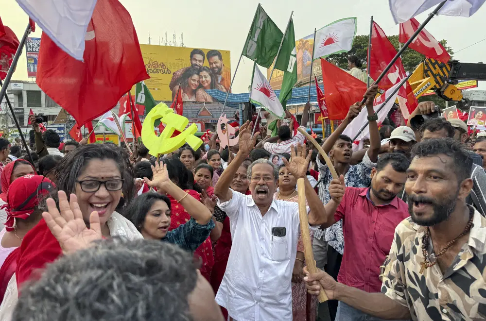 Supporters of Left Democratic Front, a political alliance led by Communist Party of India (Marxist), celebrate as campaigning ends in Kerala | AP