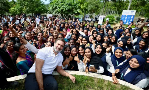 Congress leader Rahul Gandhi poses for a picture with students of Nilgiri College of Arts and Science during his visit to Tamil Nadu, at Thaloor in Nilgiri on Monday. (ANI Photo)