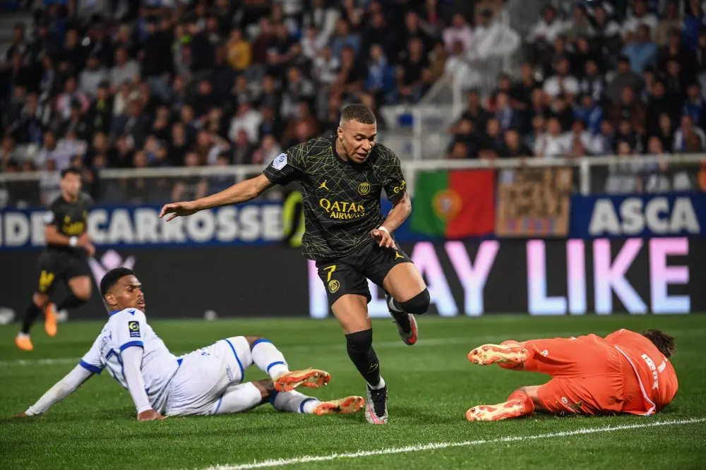 Kylian Mbappe (C) in action during the match | AFP