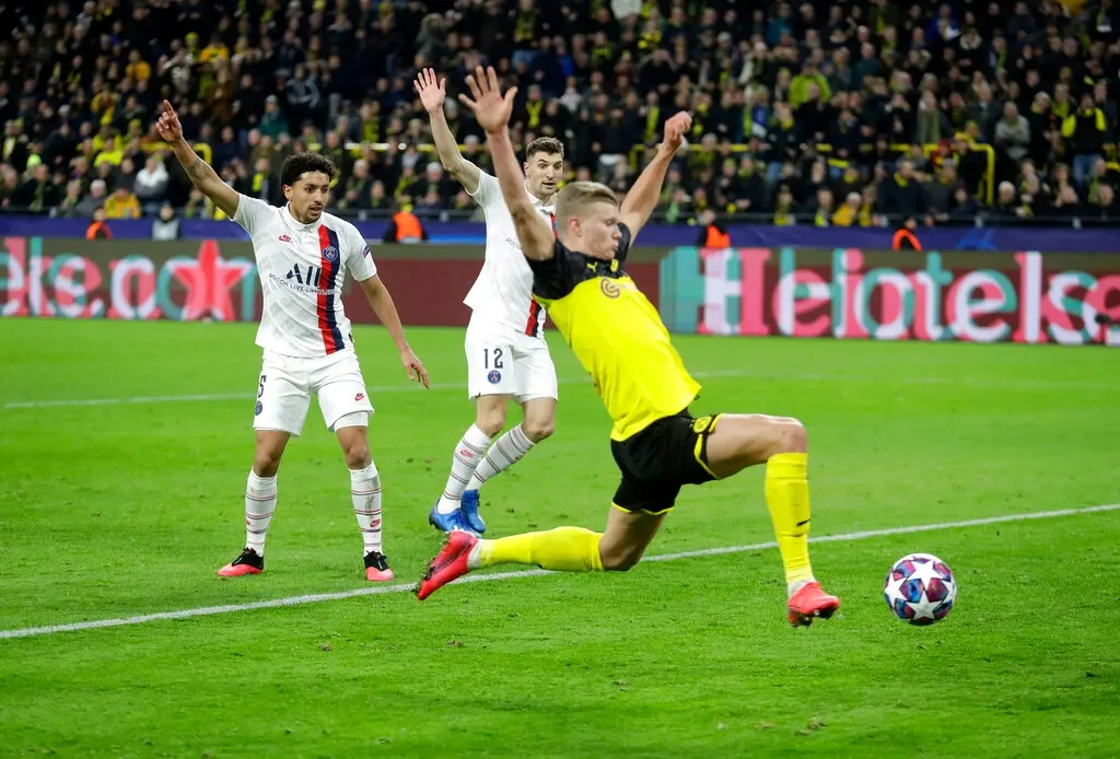 Dortmund's Erling Braut Haaland scores against Paris Saint Germain (AP photo)