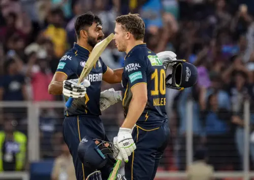 Gujarat Titans' Vijay Shankar and David Miller celebrates after winning the Indian Premier League (IPL) 2024 T20 cricket match against Sunrisers Hyderabad, at Narendra Modi Stadium, in Ahmedabad on Sunday. l Photo: PTI