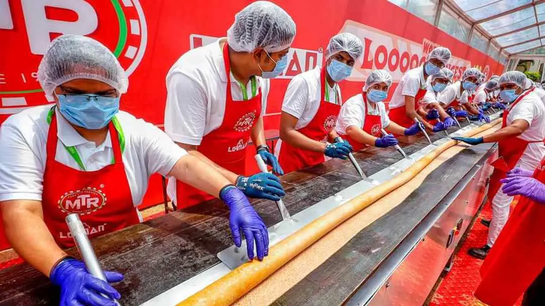 The team with the longest dosa | Photo: PTI