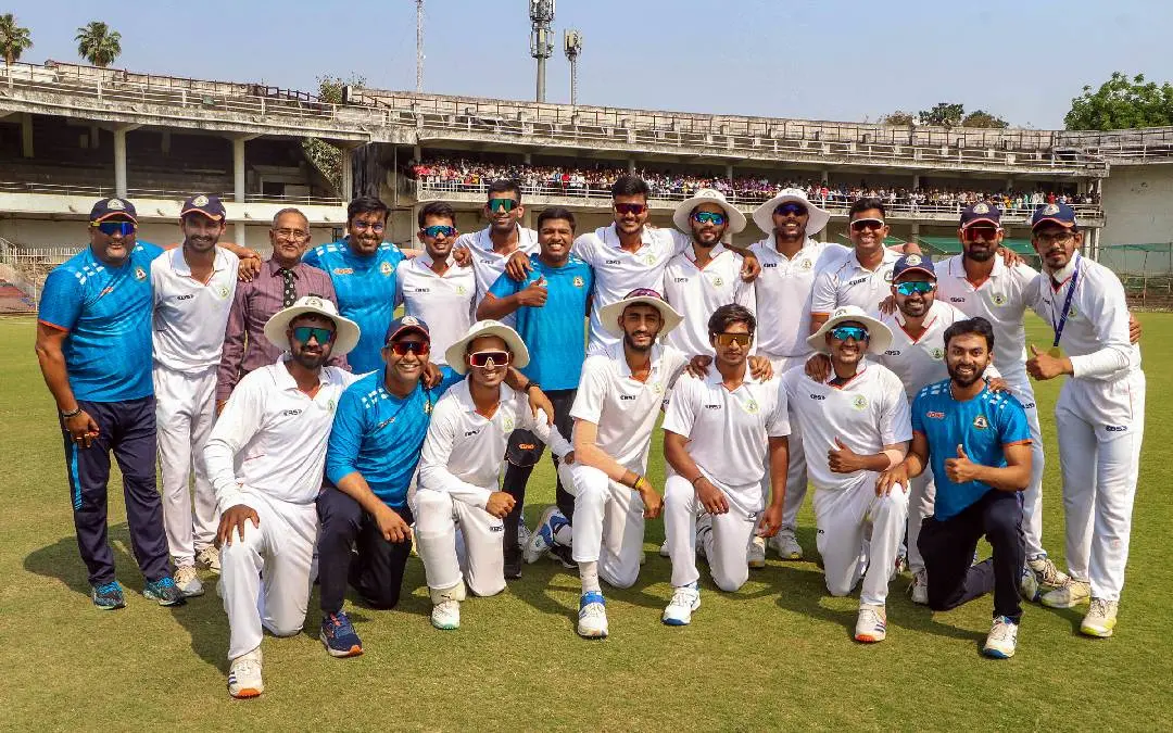 Vidarbha team members and staff pose for a photograph after the match against Madhya Pradesh. | PTI