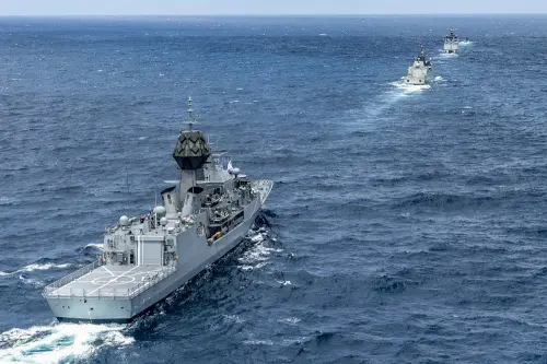 Indian naval warship reaches hijacked vessel, issues warning to pirates
