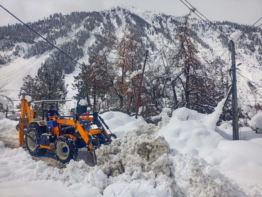 Snow clearing machine removing snow from a road at Spiti district | Photo: PTI