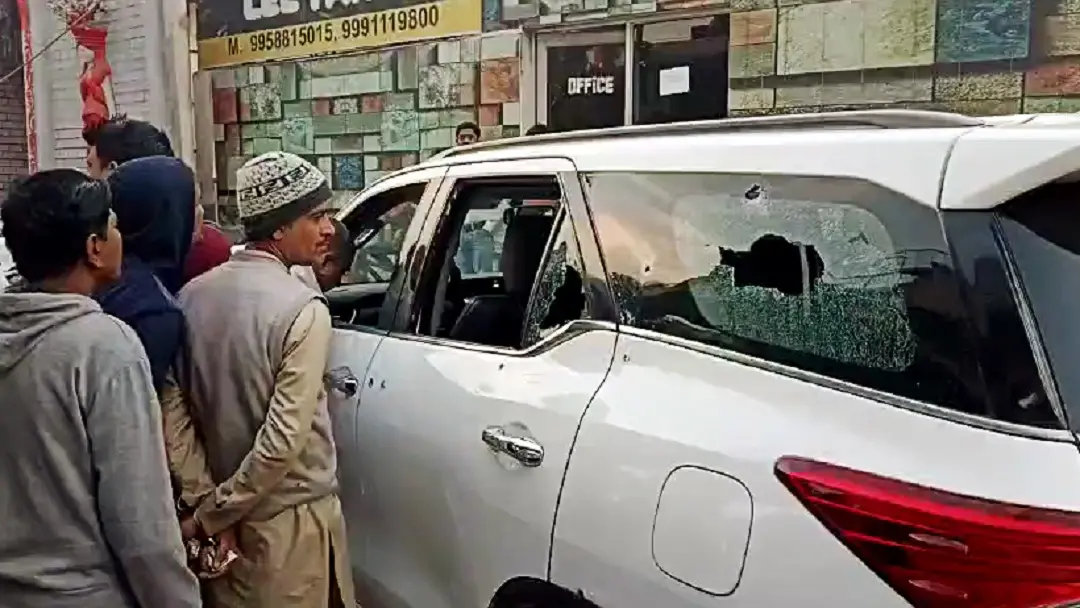 People gather at the site after Haryana INLD chief Nafe Singh Rathee was shot dead by unidentified assailants, at Jhajjar on Sunday | Photo: ANI