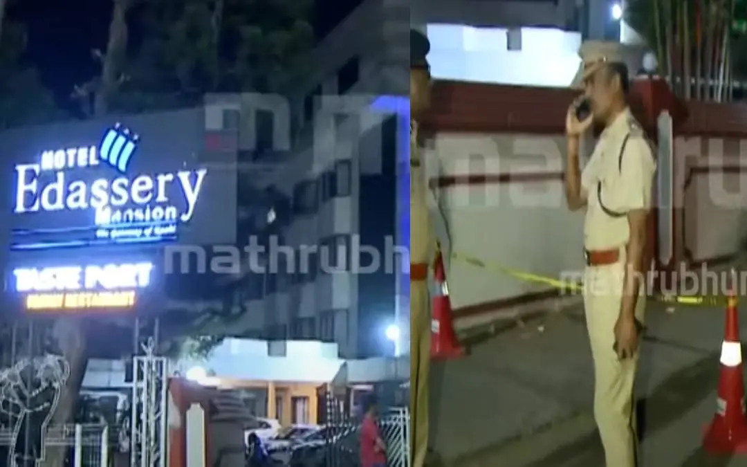 From (R) Cops at the spot, the Kathrikadavu bar. | Screengrab: Mathrubhumi News