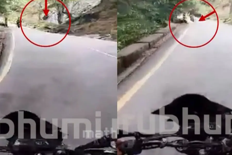 Video: Rock falls on bike passengers on Thamarassery ghat road