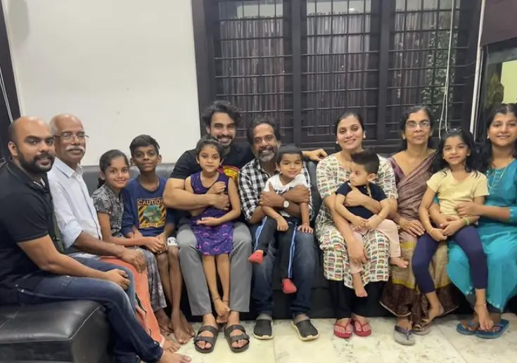 Guru Somasundaram with Tovino and family. Photo: Instagram/tovinothomas/