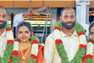 Identical twin sisters tie knot with identical twin brothers