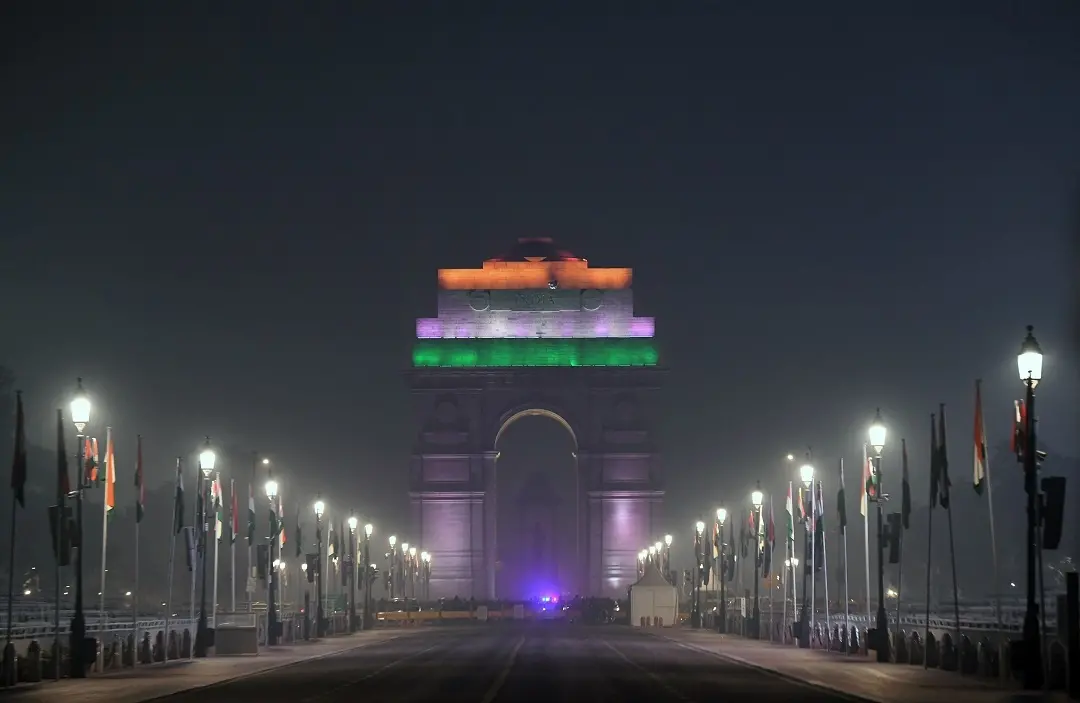 India Gate illuminates in tricolour on the eve of the 75th Republic Day | Photo: ANI