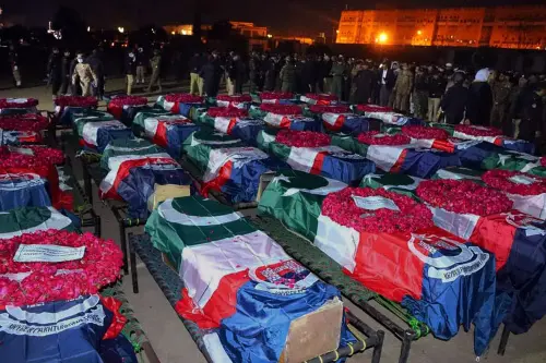 In this handout photo released by Pakistan's Police Department, security officials gather for funeral prayers of police officer, who were killed in the suicide bombing inside a mosque, in Peshawar, Pakistan, Monday, Jan. 30, 2023. A suicide bomber struck Monday inside a mosque in the northwestern Pakistani city of Peshawar, killing multiple people and wounding scores of worshippers, officials said | Photo: Pakistan's Police Department via AP