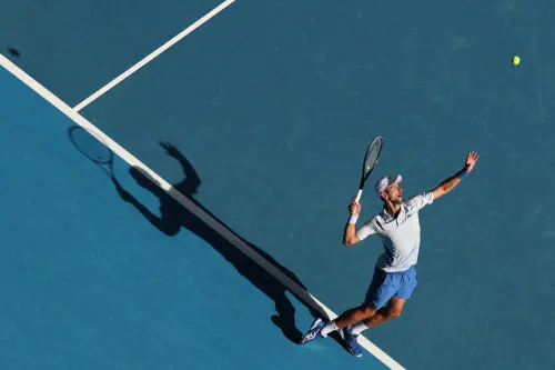 Novak Djokovic serves against USA's Taylor Fritz during their men's singles quarter-final match on day 10 of the Australian Open tennis tournament in Melbourne. (Photo: AFP)