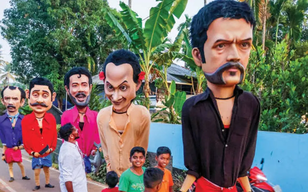 കൊടകര സെയ്ന്റ് ജോസഫ്സ് ഫൊറോന ദേവാലയത്തിലെ തിരുനാളിന് ടൗൺ അമ്പിന്റെ ഭാഗമായി സൗഹൃദ കലാവേദി വടക്കുംമുറിക്കുവേണ്ടി ഒരുക്കിയ ഹാസ്യ കഥാപാത്രങ്ങൾ. ഗുരുവായൂർ പേരകം സൗപർണിക കലാലയത്തിന്റേതാണ് കലാരൂപം