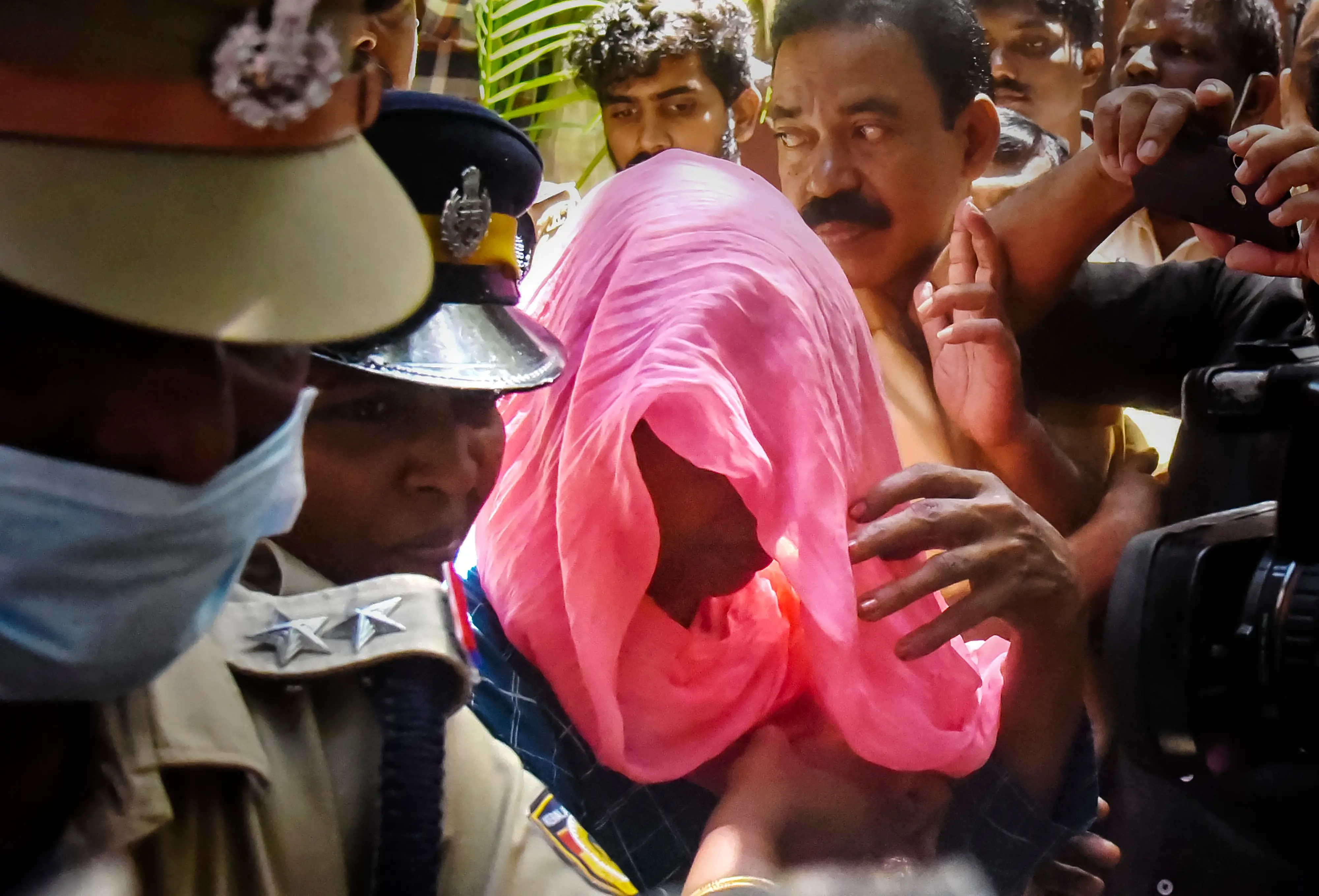 Laila, one of the accused in the Elanthoor 'human sacrifice' case, being produced at court, in Kochi. Photo: PTI