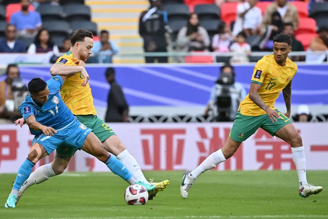 India's forward #17 Lallianzuala Chhangte fights for the ball with Australia's defender #25 Gethin Jones during the Qatar 2023 AFC Asian Cup Group B football match between Australia and India at the Ahmad bin Ali Stadium in Al-Rayyan, west of Doha | Photo: AFP