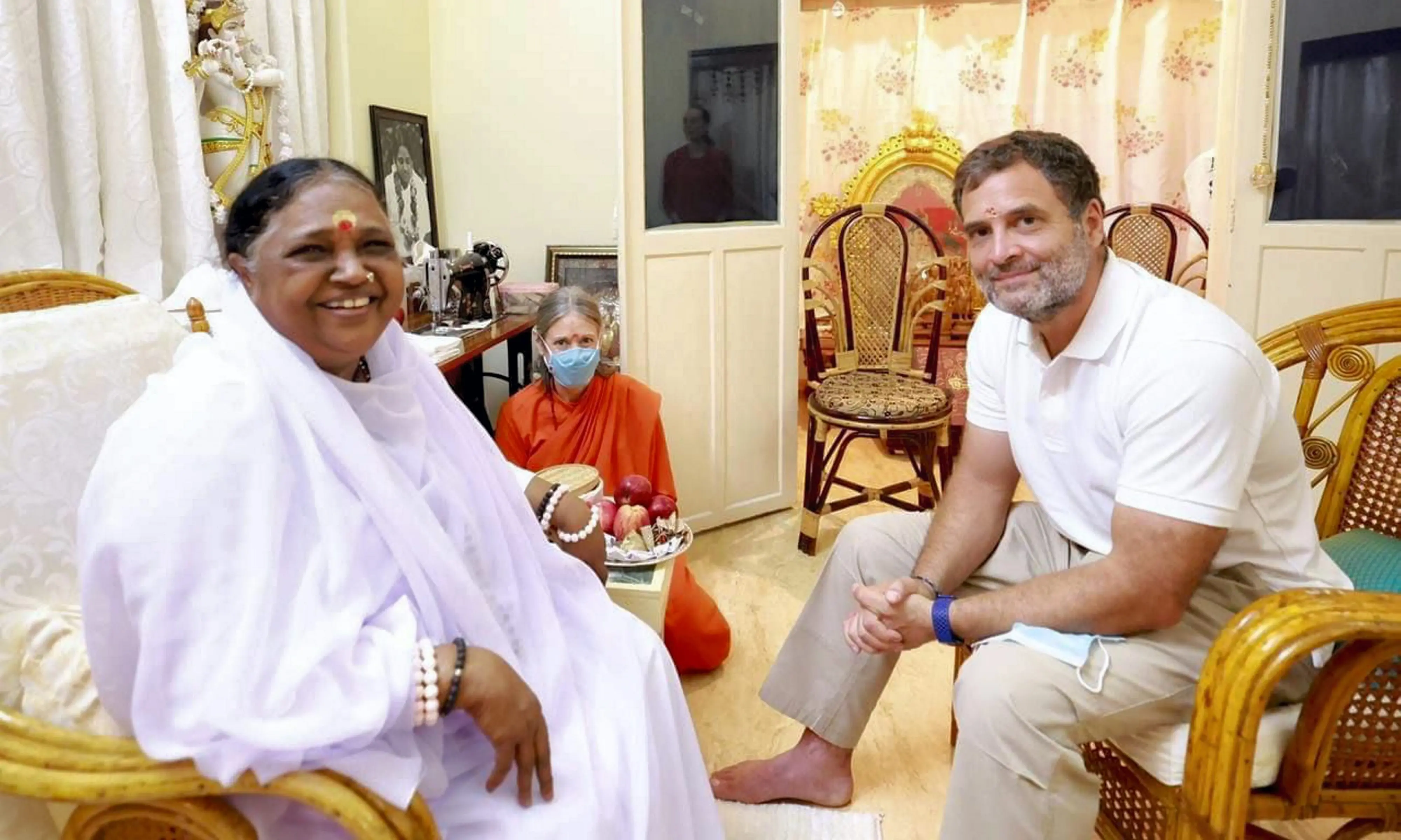 Mata Amritanandamayi, Rahul Gandhi | Photo: PTI