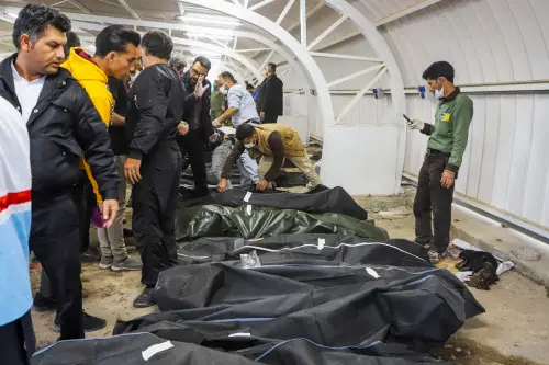 The bodies of victims killed in two explosions in quick succession that struck a crowd marking the anniversary of the 2020 killing of Guards general Qasem Soleimani, lie at a hospital in the southern Iranian city of Kerman on January 3, 2024. Iran's president Ebrahim Raisi condemned on January 3 twin blasts that killed at least 103 people in the country's south where crowds gathered to mark the killing of general Qasem Soleimani. Photo: AFP