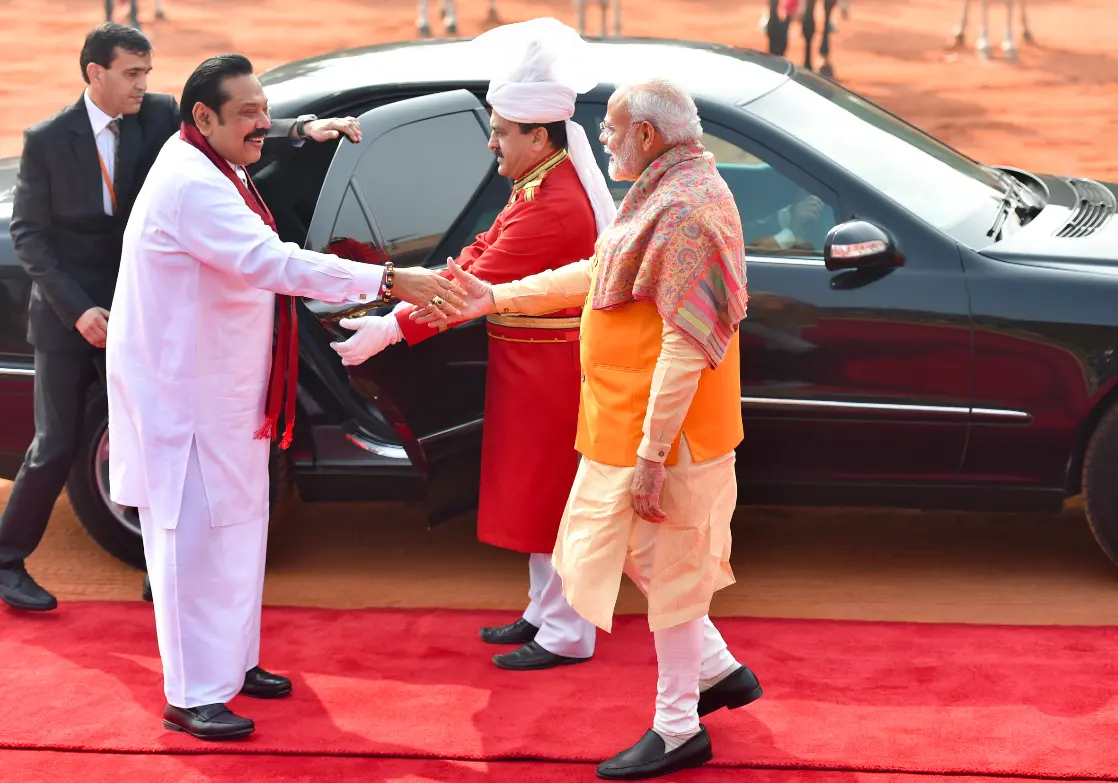 Modi greeting Sri Lankan Prime Minister. (Photo- PTI)