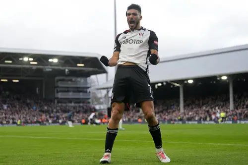 Fulham's Raul Jimenez celebrates after scoring his side's first goal during the English Premier League soccer match between Arsenal and Fulham at Craven Cottage stadium in London, Sunday, Dec. 31, 2023. Photo: AP