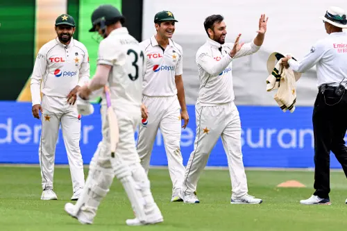 Pakistan's bowler Agha Salman (R) celebrates with teammates after dismissing Australia's batsman David Warner (2nd L) on the first day of the second cricket Test match between Australia and Pakistan at the Melbourne Cricket Ground (MCG) in Melbourne on December 26, 2023. Photo: AFP