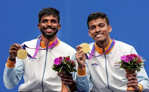 Hangzhou: Gold medalists India's Chirag Shetty and Satwiksairaj Rankireddy pose for photos during the presentation ceremony after winning the Men's Doubles Gold Medal badminton match against Korea's Choi Solgyu and Kim Wonho, at the 19th Asian Games, in Hangzhou, China, Saturday, Oct. 7, 2023. Photo: PTI