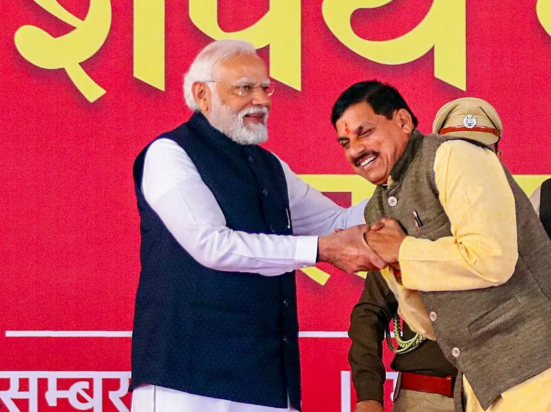 Prime Minister Narendra Modi with Madhya Pradesh Chief Minister-designate Mohan Yadav during the latter's swearing-in ceremony, in Bhopal | Photo: PTI