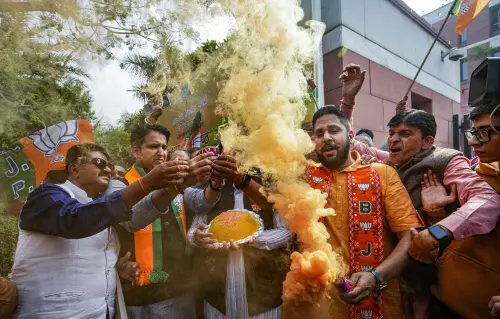 New Delhi: BJP workers and supporters celebrate the party's lead in Madhya Pradesh, Rajasthan and Chhattisgarh during counting of votes, at the party headquarters, in New Delhi, Sunday, Dec. 3, 2023. Photo: PTI