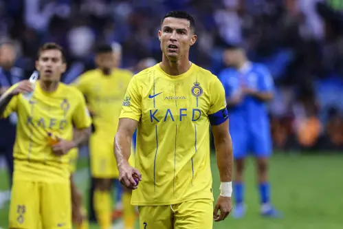 Cristiano Ronaldo walks off to chants of ''Messi, Messi'' as his team loses 3-0 in Riyadh derby