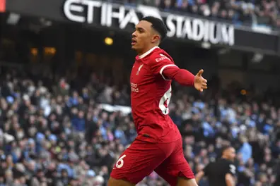 Arsenal goes top after Liverpool halts Man City's winning streak