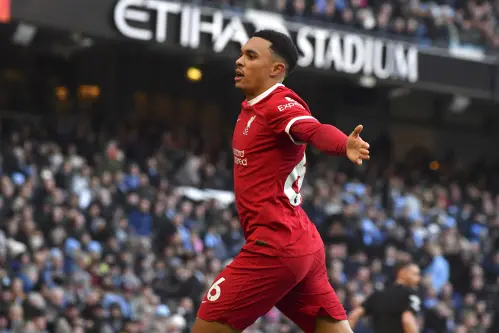 Arsenal goes top after Liverpool halts Man City's winning streak