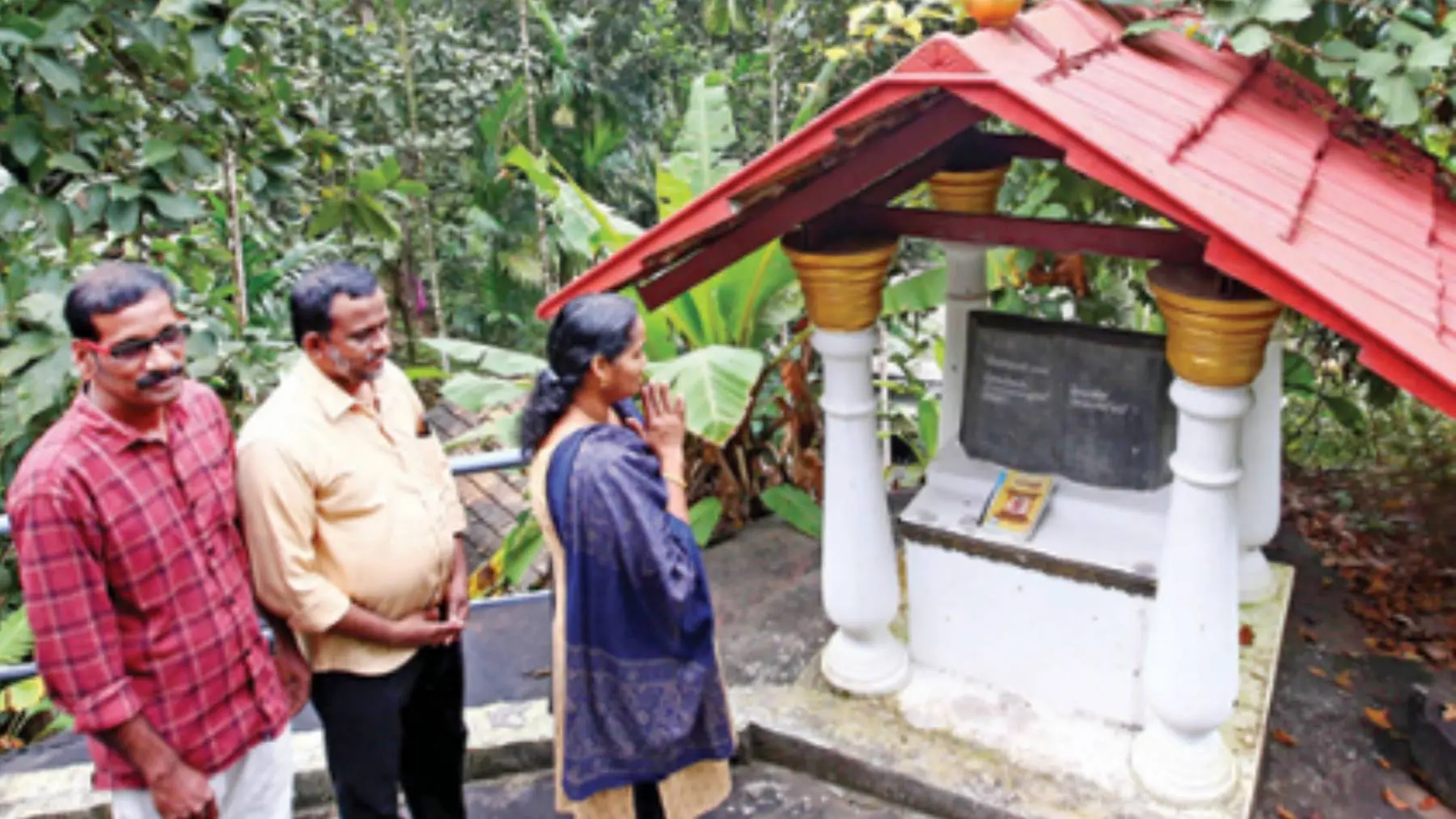 A woman worships at knowledge centre in Cherupuzha.