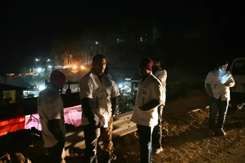 Paramedics wait near the tunnel where rescuers work on the final stage to reach workers trapped in the Silkyara road tunnel, days after it collapsed in the Uttarkashi district of India, on November 22, 2023. Indian rescuers have drilled two-thirds of the way through debris towards 41 workers trapped in a collapsed road tunnel, warning that the next 24 hours could be critical, officials said on November 22, 2023. Photo: AFP