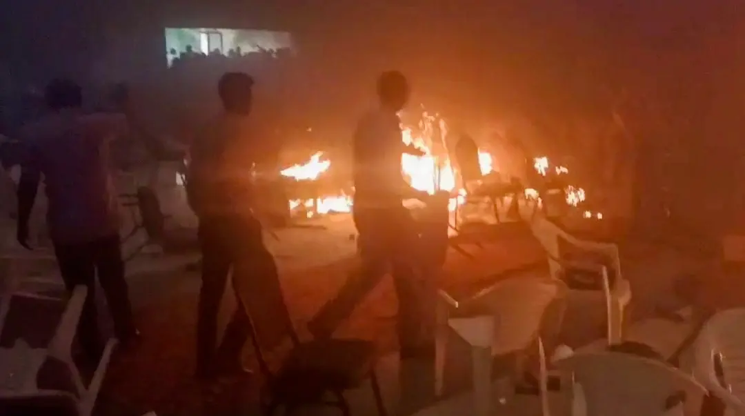 People rush to save themselves after a blast at a convention centre in Kalamassery, in Ernakulam district, Sunday, Oct. 29, 2023. At least one person died and over 20 were injured, according to police. (PTI Photo)
