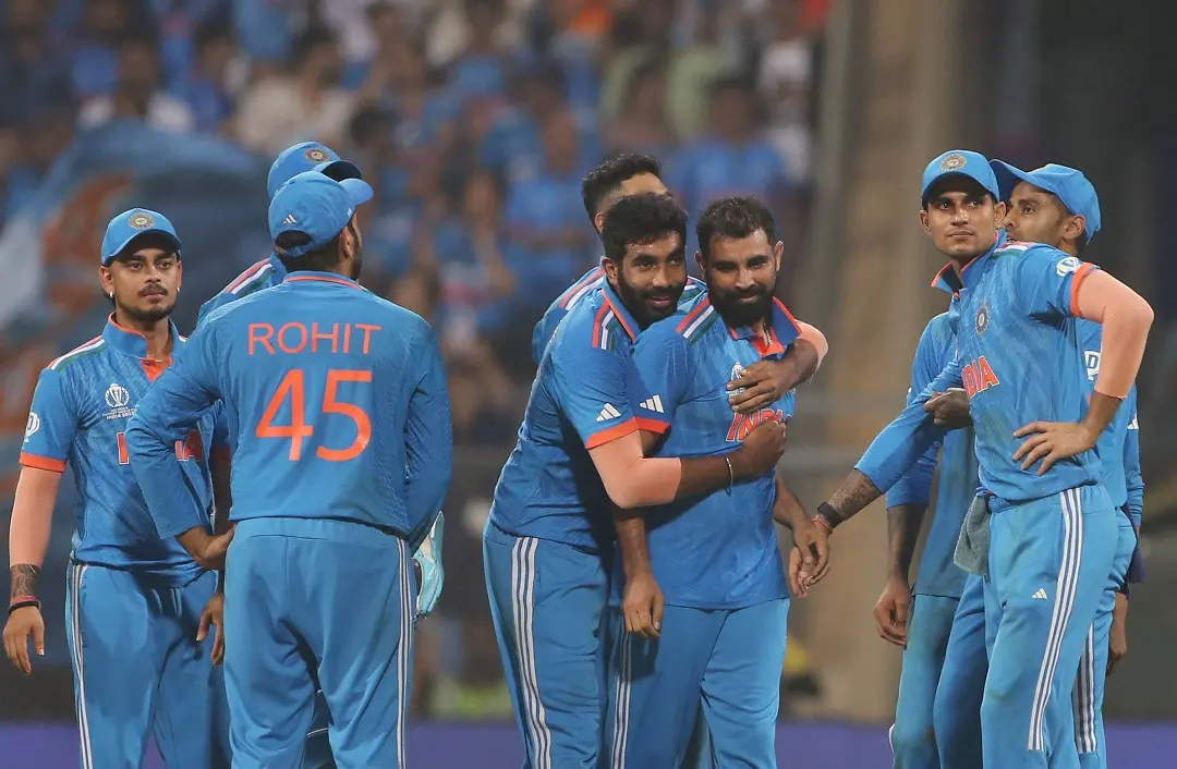 India's Mohammed Shami and teammates celebrate the dismissal of New Zealand's Tom Latham during their match in the ICC Men's Cricket World Cup 2023 | Photo: ANI