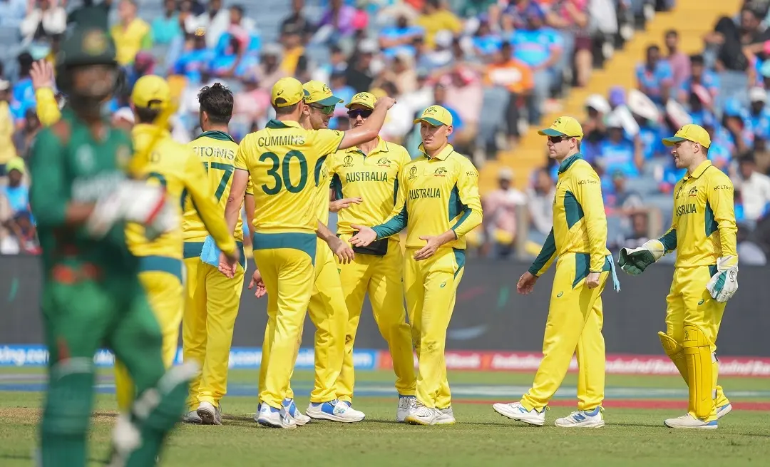 Australia's Marnus Labuschagne celebrates with teammates after taking the catch of Bangladesh's Towhid Hridoy | Photo: PTI