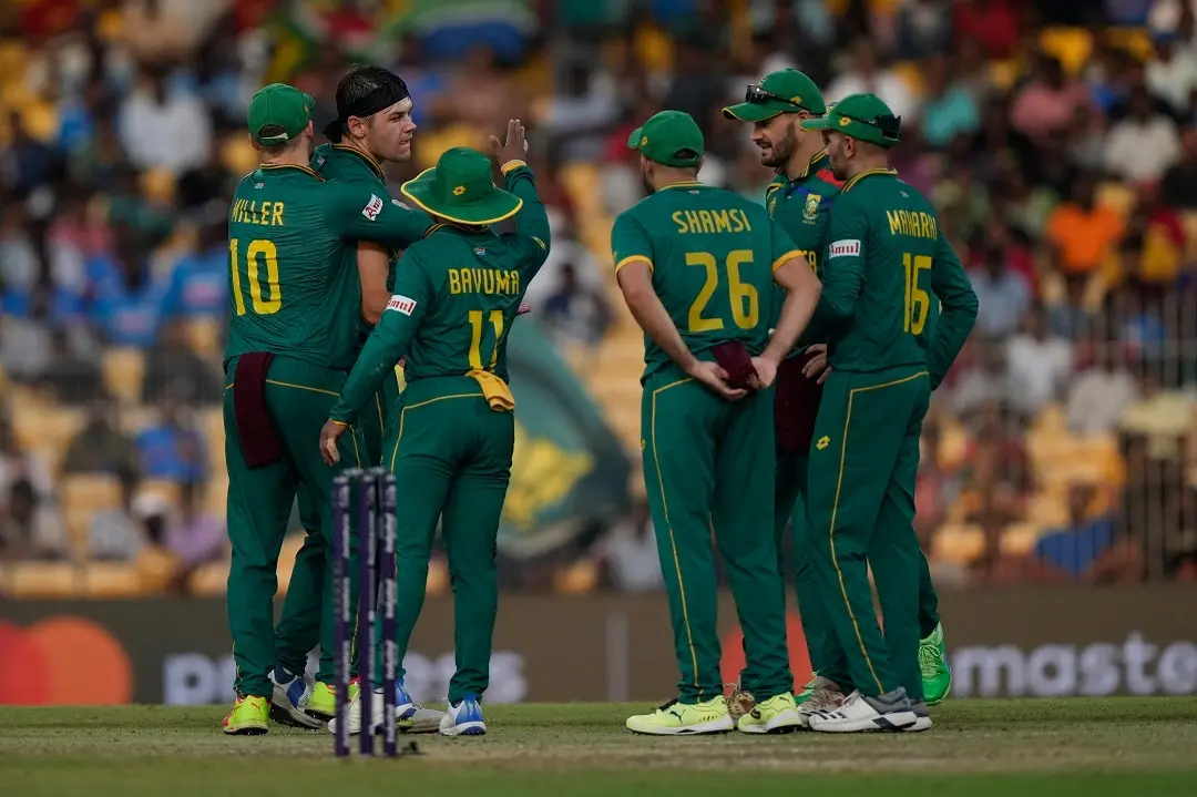 South African cricketers celebrate the dismissal of Pakistan's Shadab Khan during the ICC Men's Cricket World Cup match between South Africa and Pakistan | Photo: AP