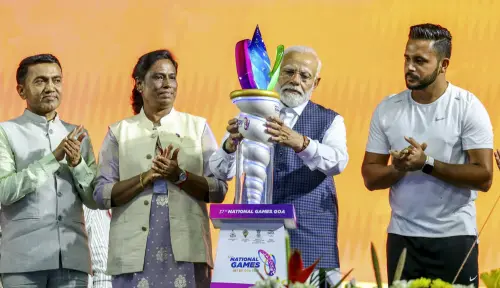 Prime Minister Narendra Modi, Goa Chief Minister Pramod Sawant and Indian Olympic Association President P.T. Usha with Indian men's hockey team captain Harmanpreet Singh during the opening ceremony of the 37th National Games, at Pandit Jawaharlal Nehru Stadium in Goa, Thursday, Oct. 26, 2023 | Photo: PTI