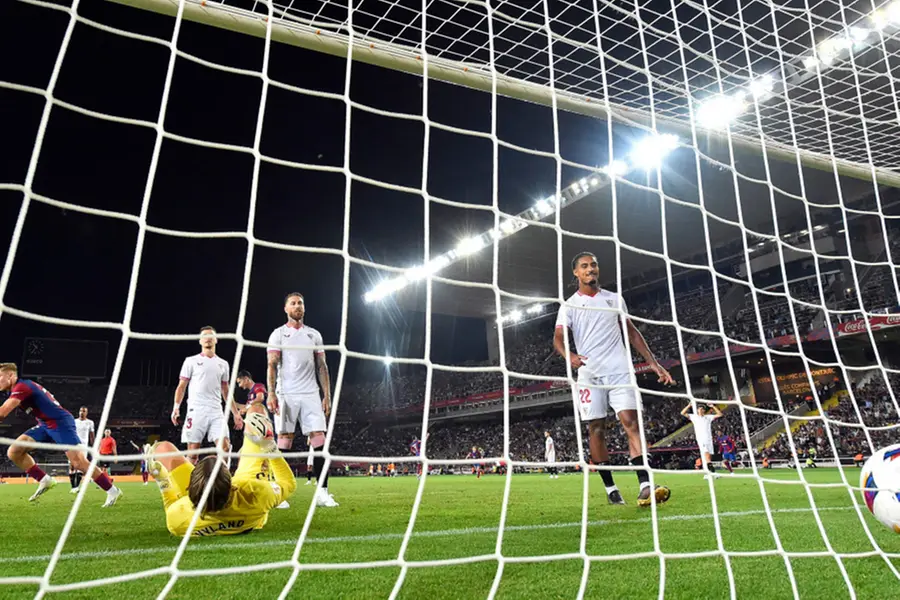 Sergio Ramos own goal helps Barca beat Sevilla