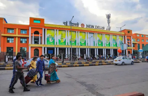 New Delhi: People walk past the New Delhi Railway Station on the eve of the G20 Summit, in New Delhi, Friday, Sept. 8, 2023. (PTI Photo)