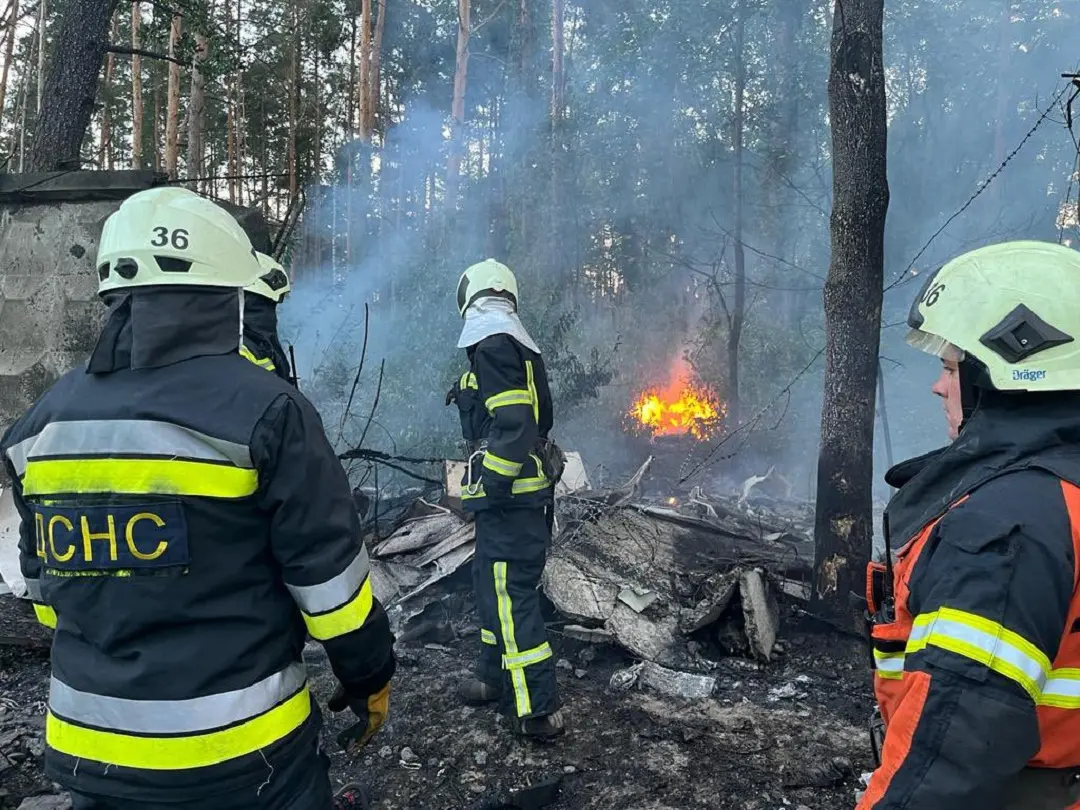 Firefighters extinguishing a fire following a Russian missile attack, outside Kyiv, amid the Russian invasion of Ukraine | Photo: AFP