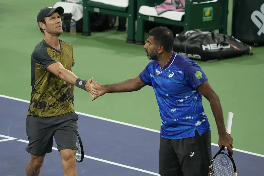 Matthew Ebden, of Australia, left, with teammate Rohan Bopanna | AP
