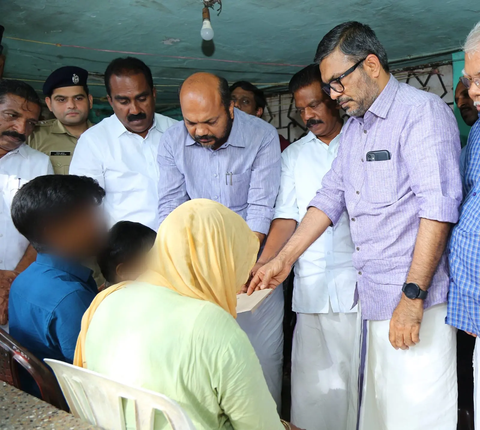 Kerala ministers K Radhakrishnan, P Rajeev, and MB Rajesh visiting house of girl who was assaulted and killed in Aluva by her neighbour | Photo: www.facebook.com/prajeevofficial