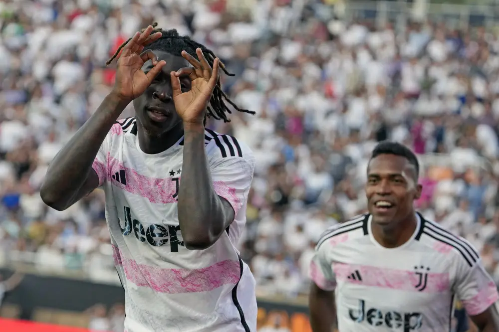Moise Kean gestures to fans after scoring a goal against Real Madrid | AP